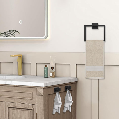 JOPOFI toilet paper holder in matte black complements modern bathroom design.