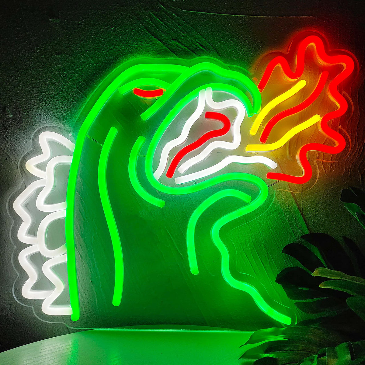JOSEBRU King Monster neon sign on wall enhances gaming room ambiance.