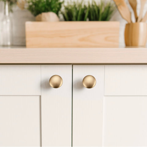 JOY DECOR champagne bronze knob on a drawer front demonstrating smooth daily use
