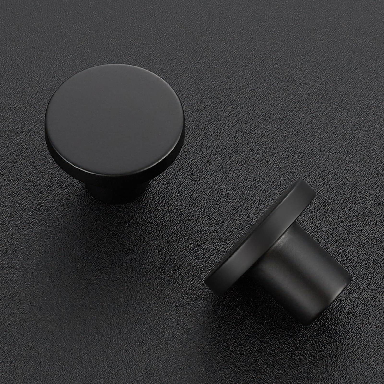 JOY DECOR matte black round drawer pull on a cabinet for a modern look