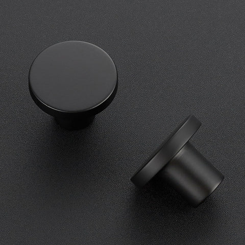 JOY DECOR matte black round drawer pull on a cabinet for a modern look