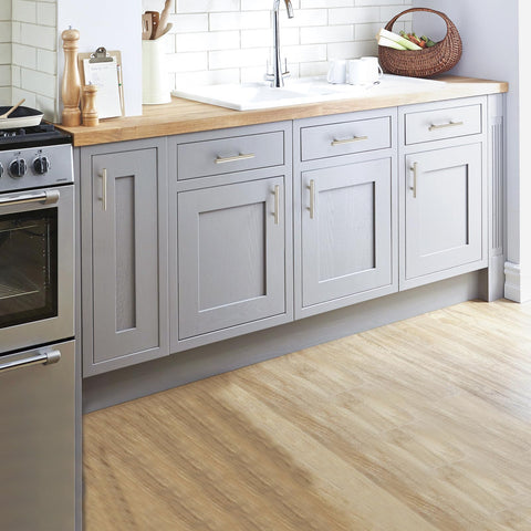 Joy Decor brushed nickel sheen enhances modern cabinet styling.