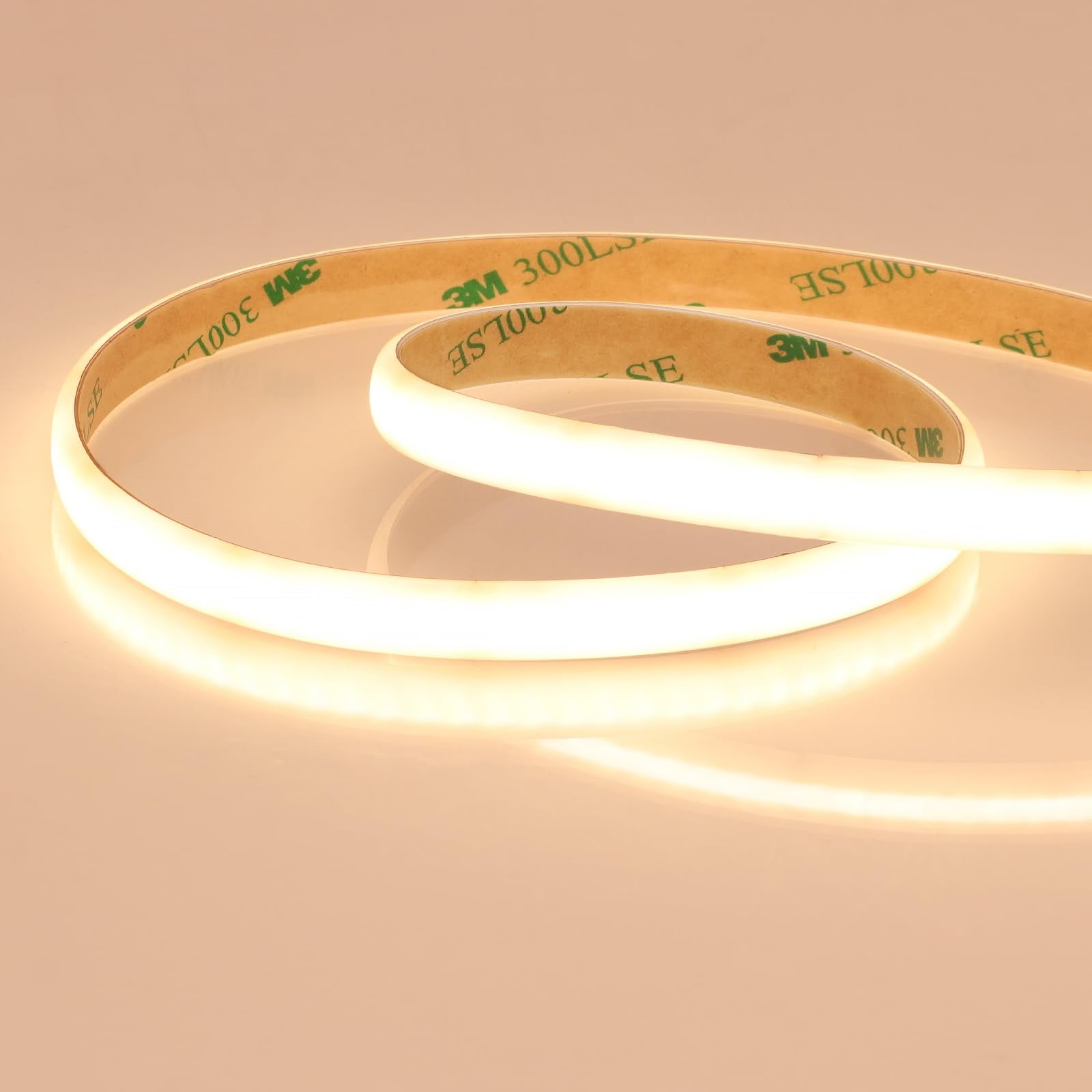 JOYLIT diffused COB LED strip in warm white lights long cabinets with even, dot-free lighting.