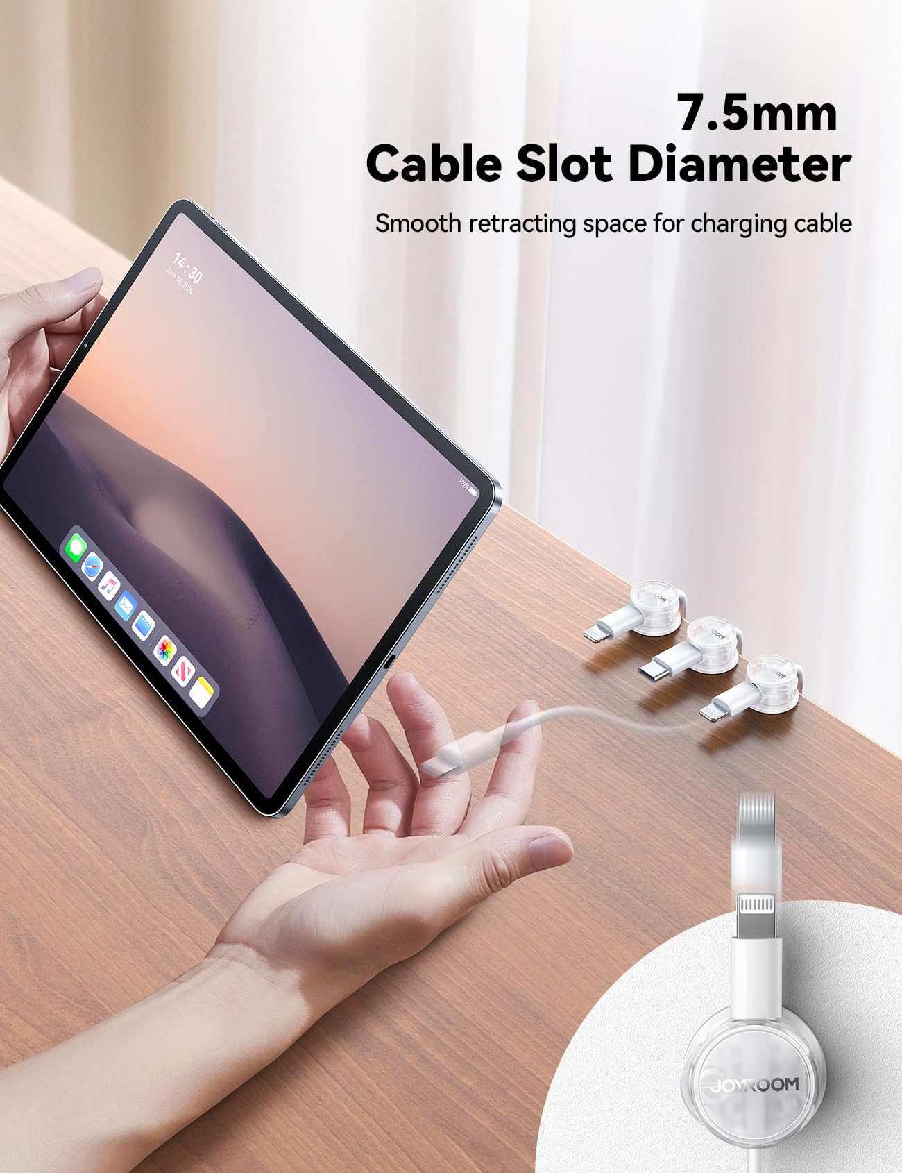 JOYROOM cable organizer on desk keeps cords tidy.