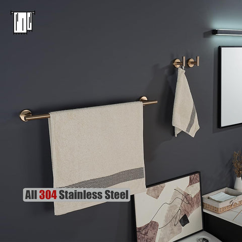 JQK toilet paper holder with champagne bronze finish for easy roll access.