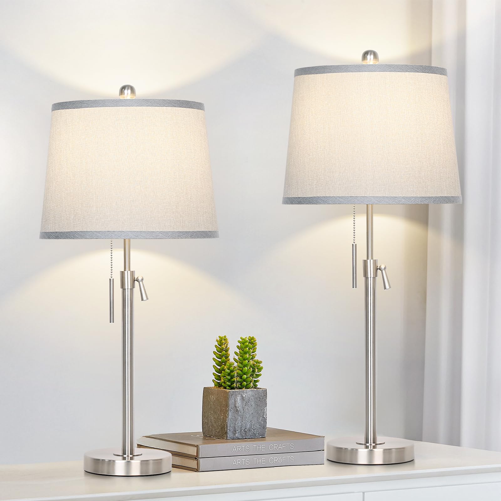 JUNNAI table lamp base in silver provides stable support for living room end tables.