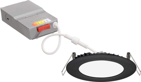 Juno 4-inch wafer downlight close-up with matte black trim, ideal for modern living rooms.