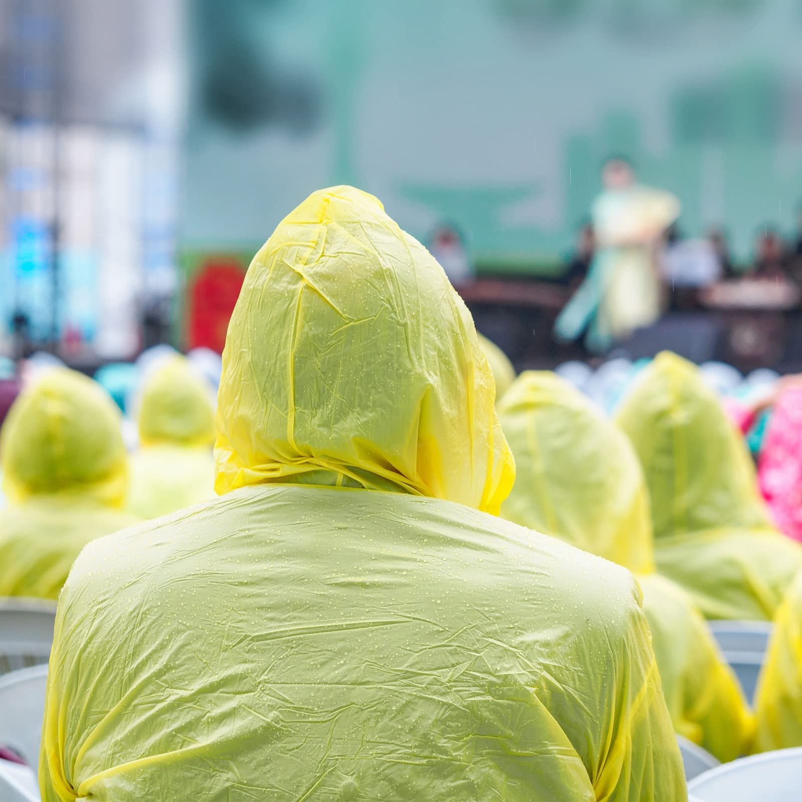 Juvale red poncho adds visibility in light rain.