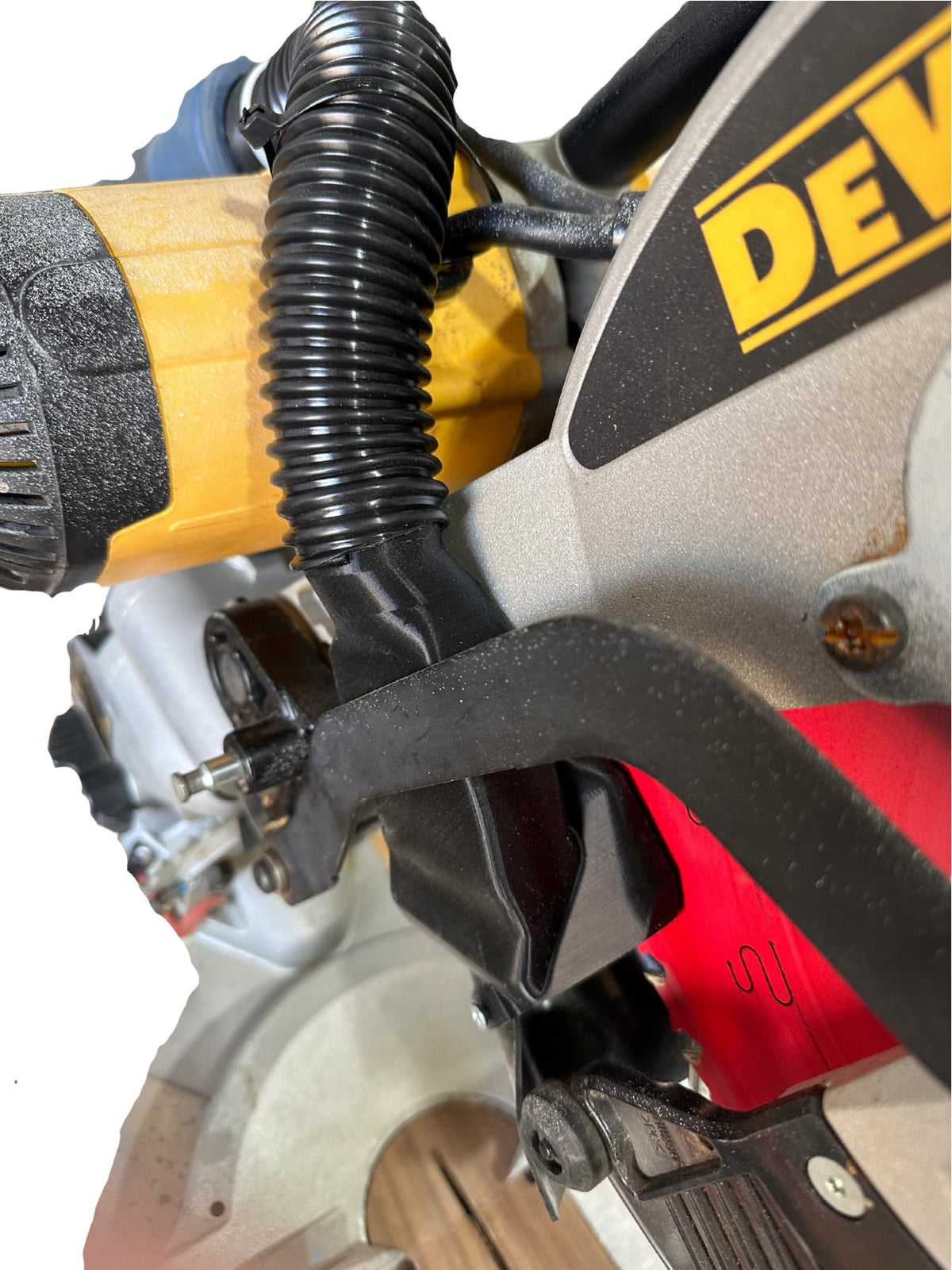 JZ Wood Shop dust collection attachment mounted on a miter saw for cleaner, dust-free cuts.