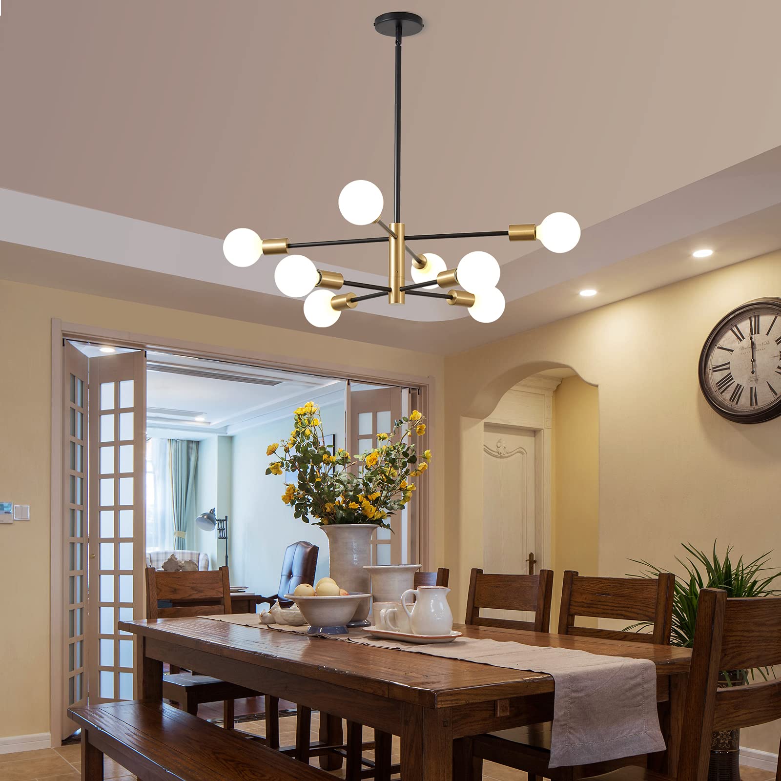 KAISITE mid-century chandelier black and gold finish adds luxe style