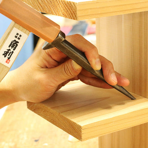 KAKURI dual-head nail punch close-up showing versatile functionality.
