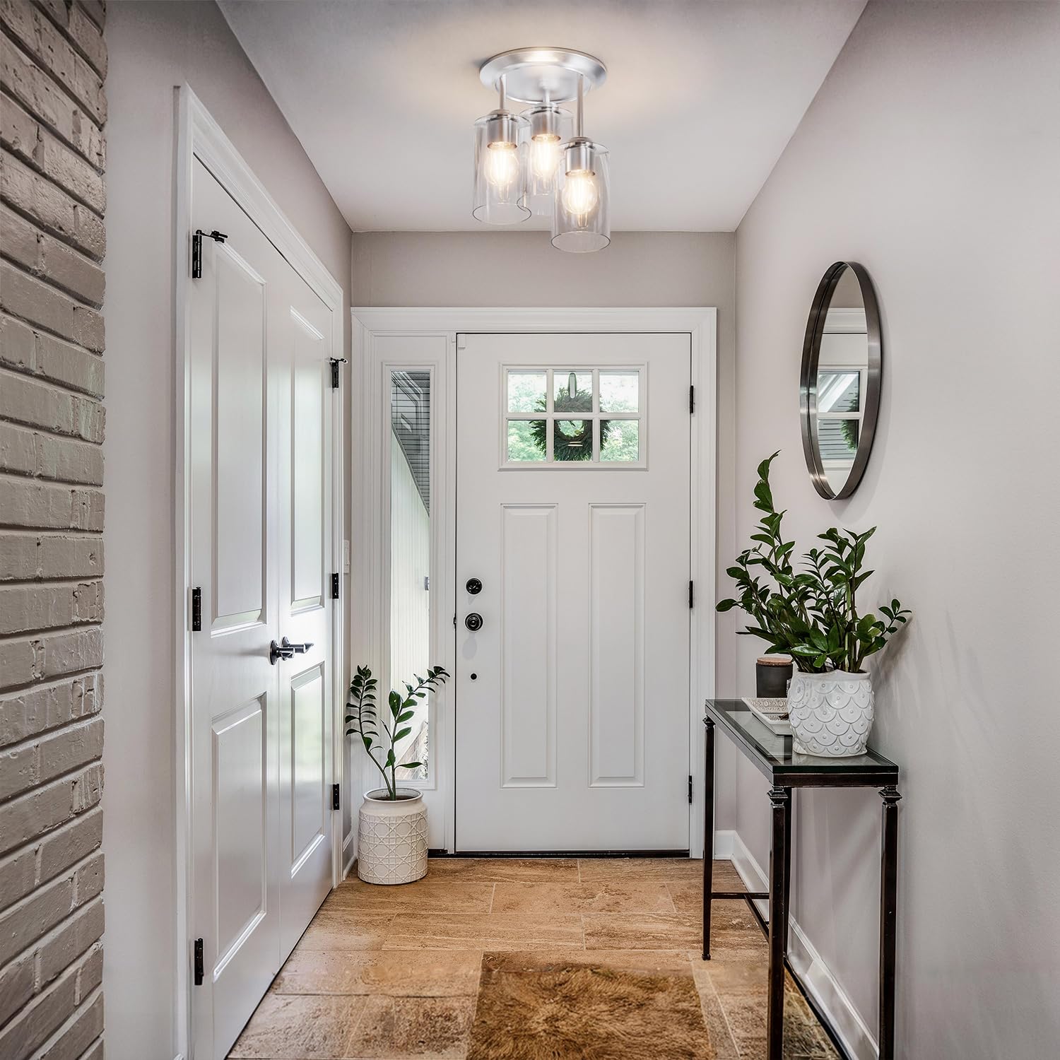 Kalium clear glass shade detail adds elegant sparkle to entryways and hallways