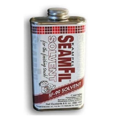 Kampel SeamFil SF-99 solvent bottle pour, enabling effortless cleanup after curing SeamFil.