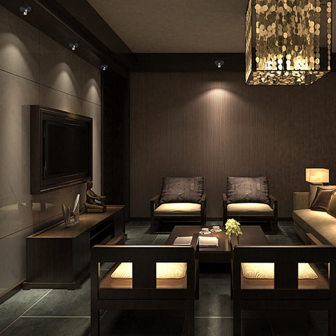 KANESIKI Spotlight remote-controlled puck light for convenient lighting from afar.