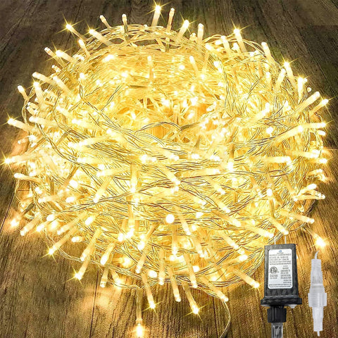 KAQ 240LED 88ft connectable string lights spanning outdoor patio for festive evenings.