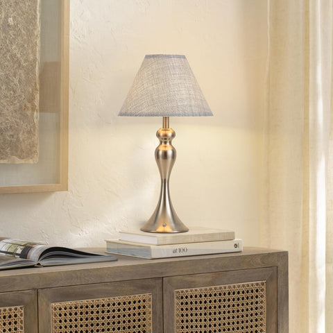 KARTOOSH cordless lamp in living room offers versatile ambient lighting.