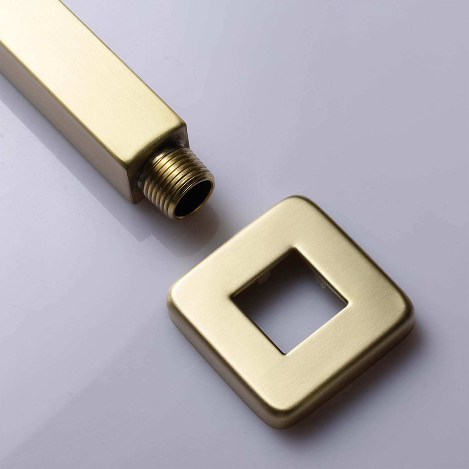 KATAIS-branded packaging featuring the brushed gold shower arm