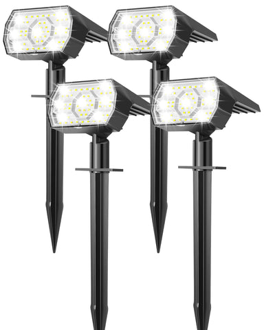 Kaxiida solar lights along a garden path using 56 LEDs for bright, even visibility