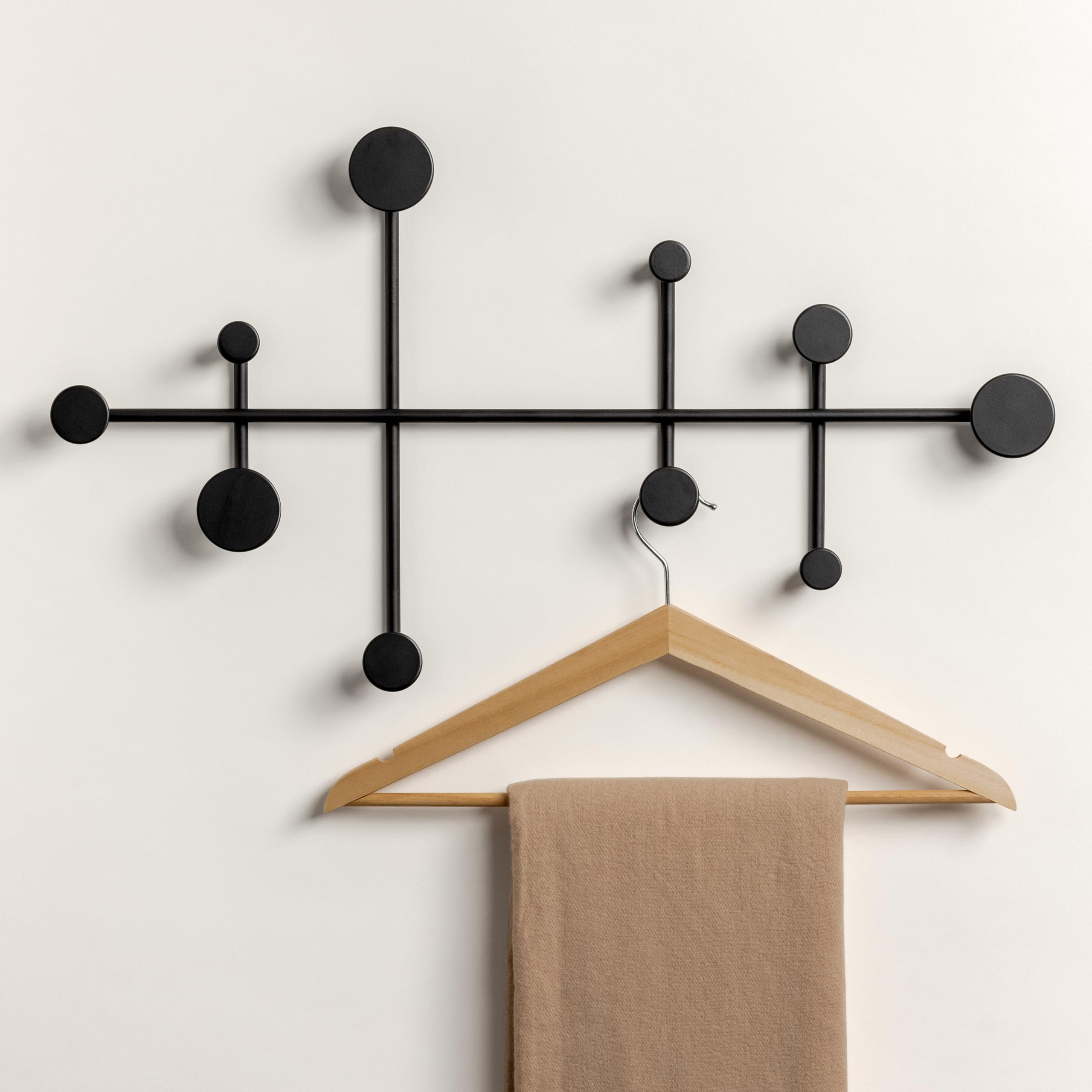 Kazai Sval wall wardrobe front view shows minimalist, space-saving design for entryways.
