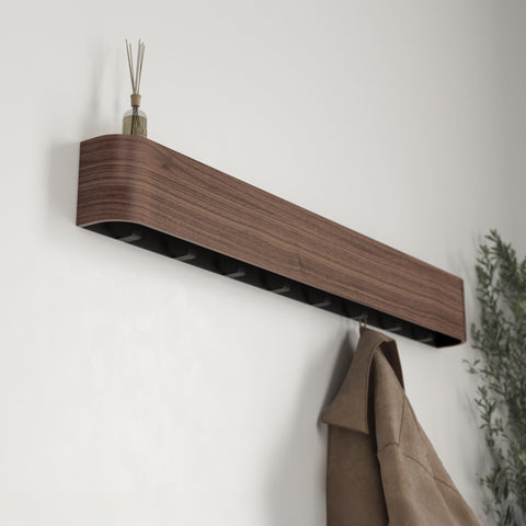 Kazai Toke mounted on drywall with anchors shows sturdy support.