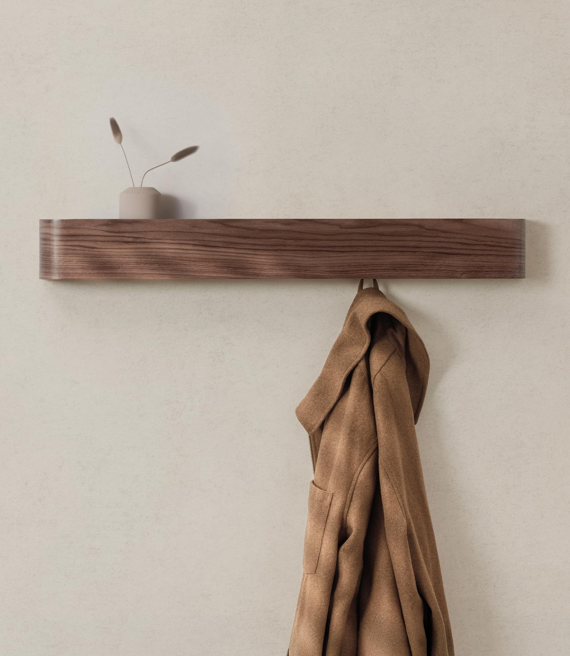 Kazai Toke wall-mounted coat rack side view highlights slim profile and hidden hooks.