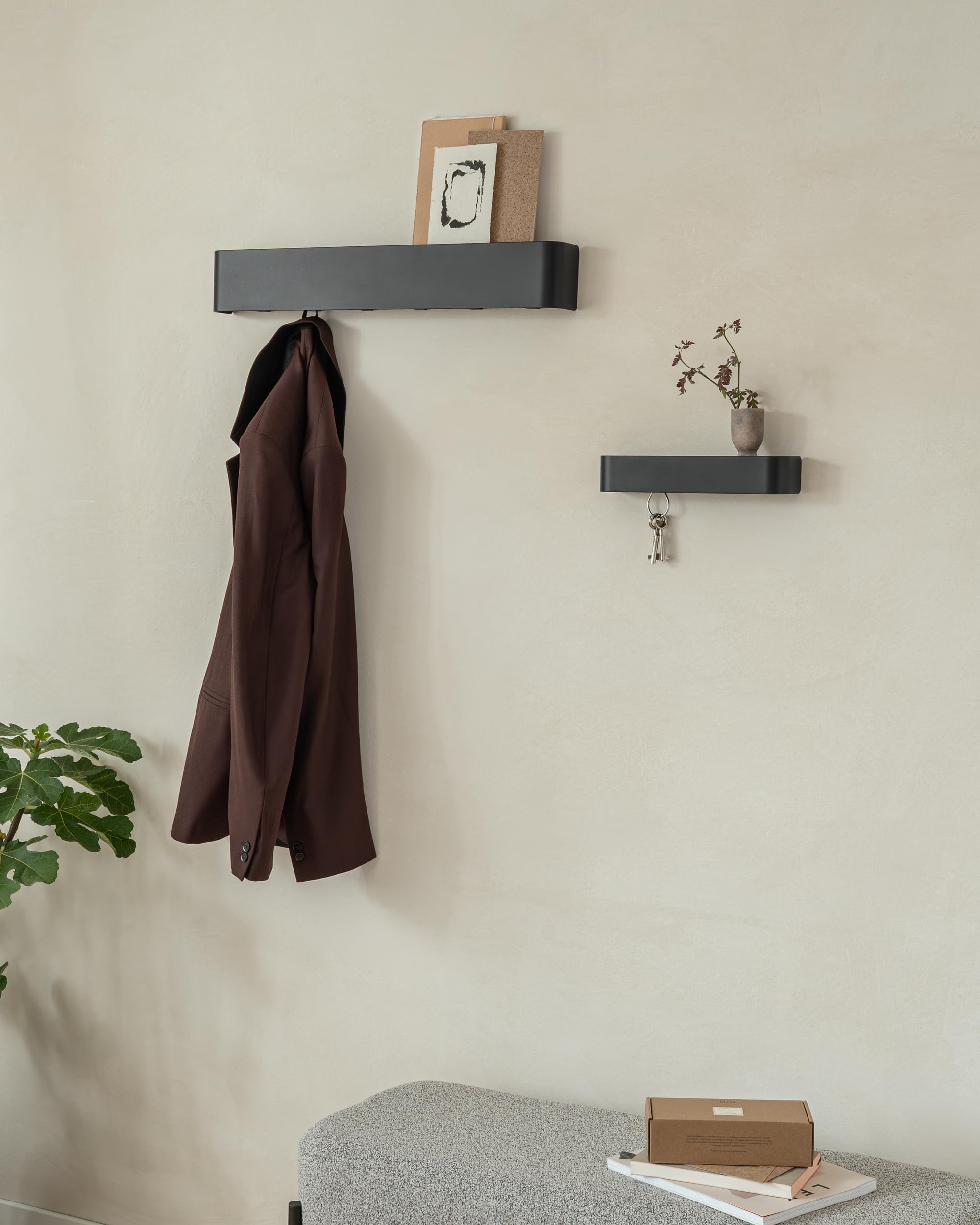 Kazai Tone 24in length coat rack fits narrow hallways elegantly.