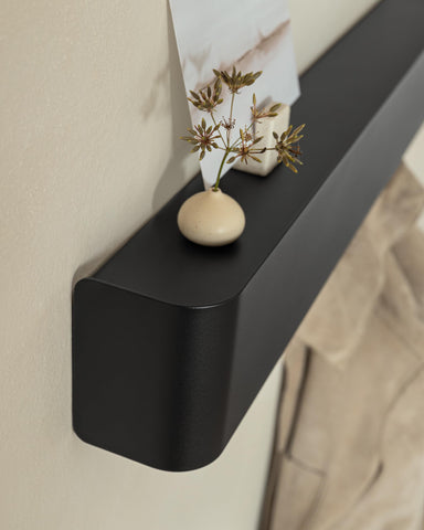 Kazai Tone rack with hidden hooks for tidy coats and accessories.