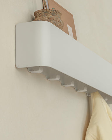 Kazai Tone hidden hooks create a clean, uncluttered wall