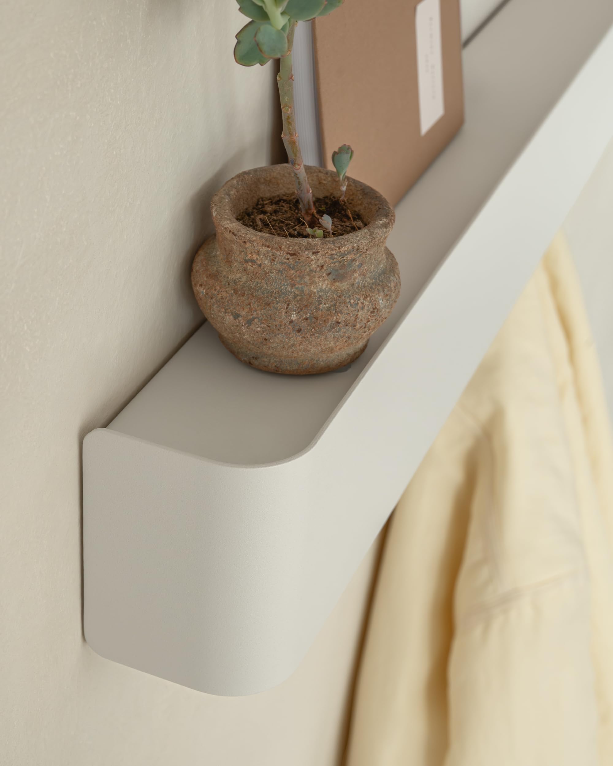 Kazai Tone top shelf storage keeps keys and hats neatly organized