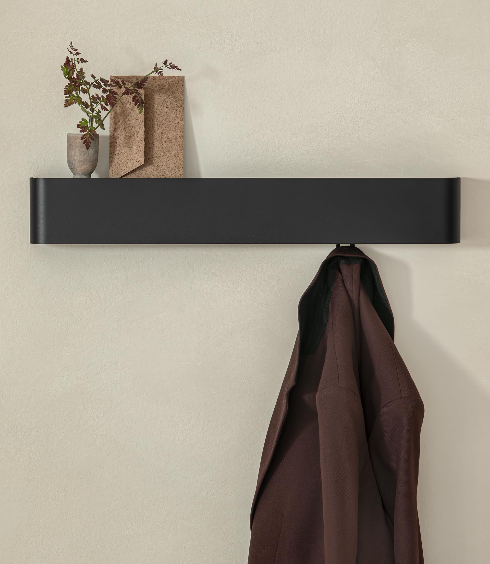 Kazai Tone wall-mount coat rack with shelf in black: organized entryway solution.