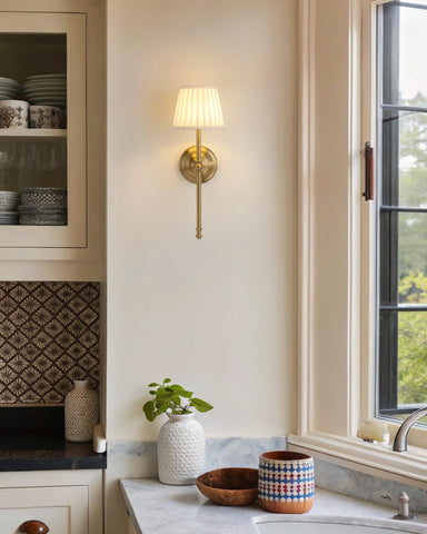 Bedroom setup with KDG sconces providing versatile wall lighting