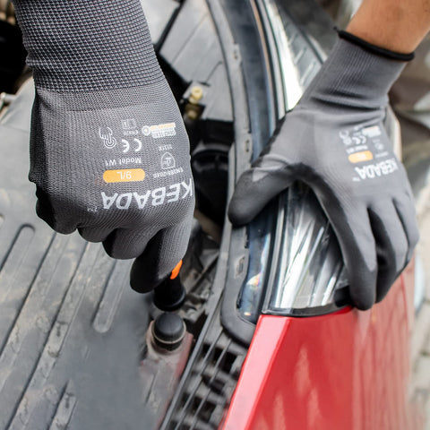 Kebada W1 gloves enabling touchscreen device use without removal.