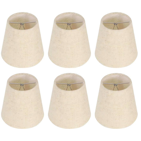 Kenqulio clip-on lampshade on a candelabra bulb softens light for a cozy living room.