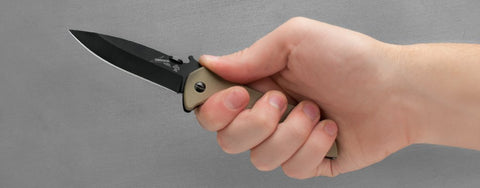 Kershaw Emerson CQC-4K blade detail, drop-point edge designed for precise cuts.