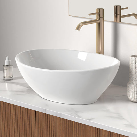 KES egg-shape above-counter sink in white ceramic adds sleek elegance.