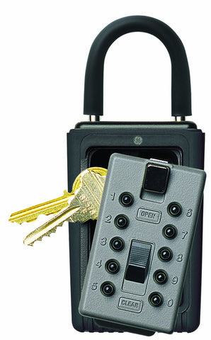Kidde AccessPoint 001166 KeySafe hung on a doorknob for secure, portable key storage.