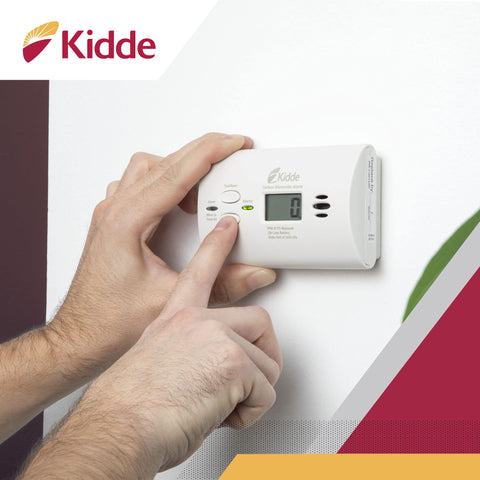 Kidde green power LED indicating the unit is powered on.