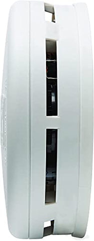 Kidde smoke detector installed near a bedroom for early warning.