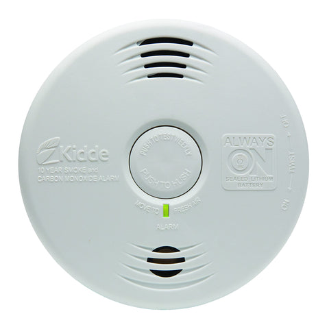 Kidde test-hush button close-up for silencing false alarms safely.