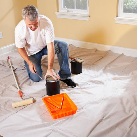 KingOrigin Canvas Drop Cloth shields floors during renovations and messy tasks.