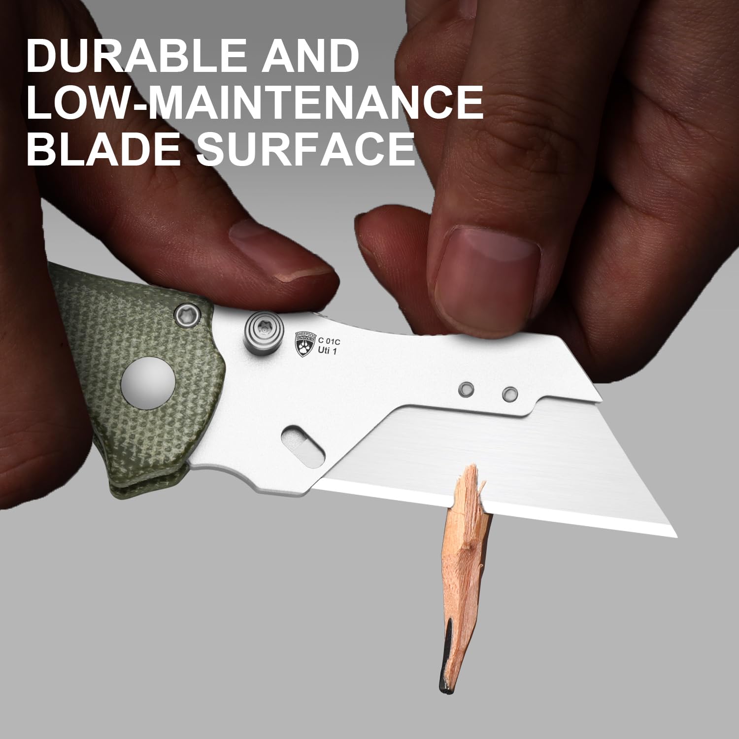 Kizer C01C Uti 1 ergonomic grip with jimping and finger choil.
