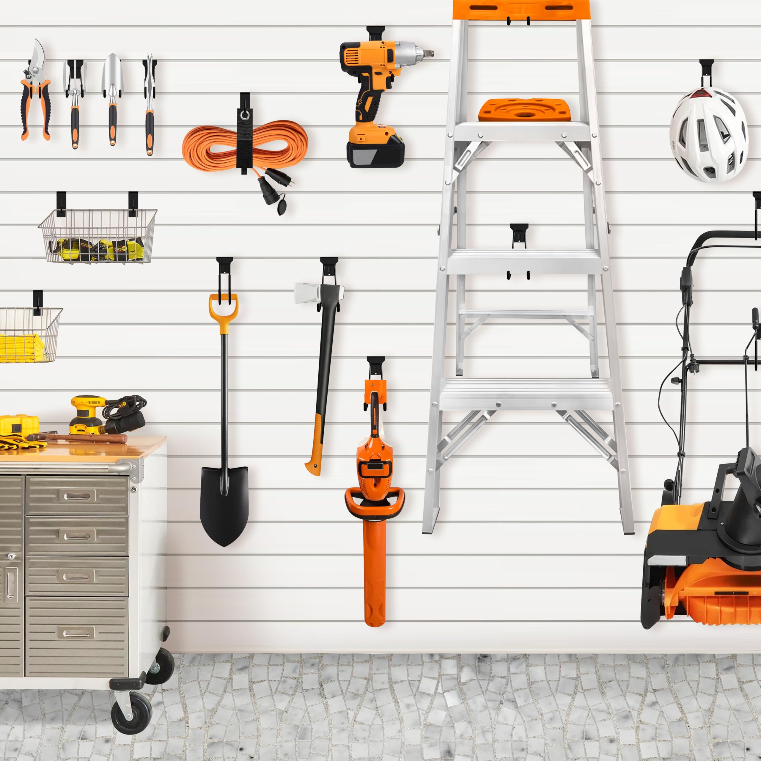 Klasit large J-hook on wall optimizes garage tool layout.