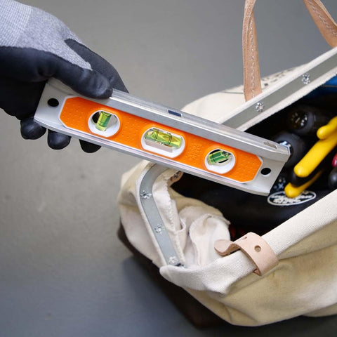 Klein Tools 935R level on conduit demonstrates secure alignment.