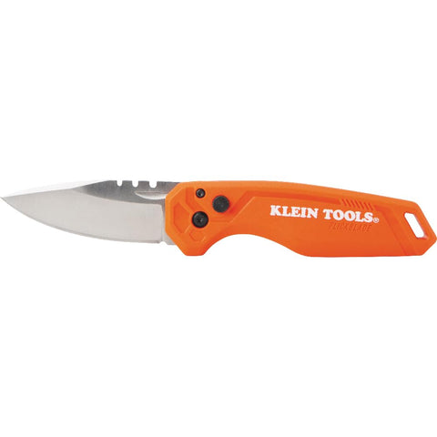 Klein Tools FlickBlade folding knife in hand shows compact EDC design.