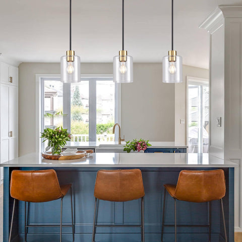 KLSS black brass pendant light 12 inch stem close up shows clear glass shade and premium finish