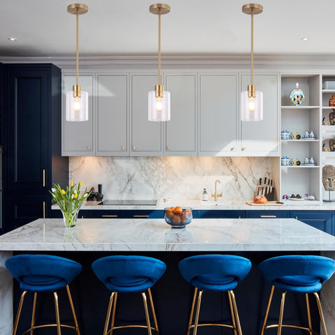 KLSS pendant light in gold finish adds warm ambience to dining spaces.