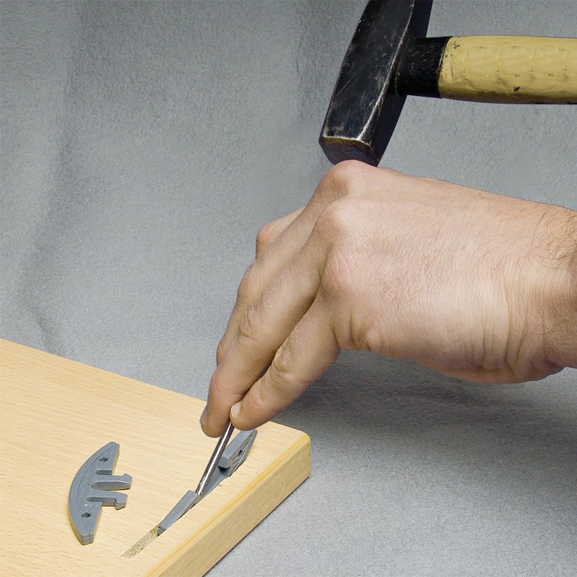 KNAPP biscuit connector used in wood projects for furniture and millwork versatility.