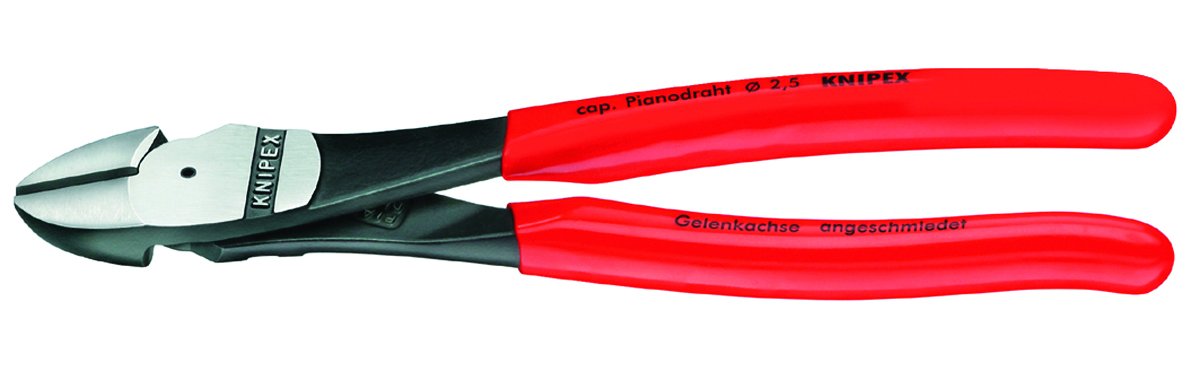 KNIPEX 74 01 180 close-up of cutting edges, 64 HRC strength in action.