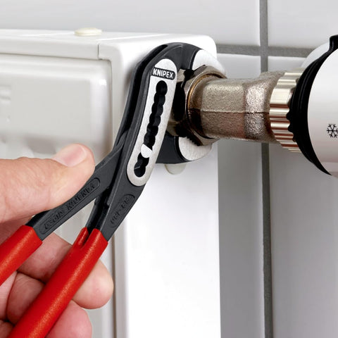 KNIPEX self-locking feature prevents slipping on pipes and nuts.