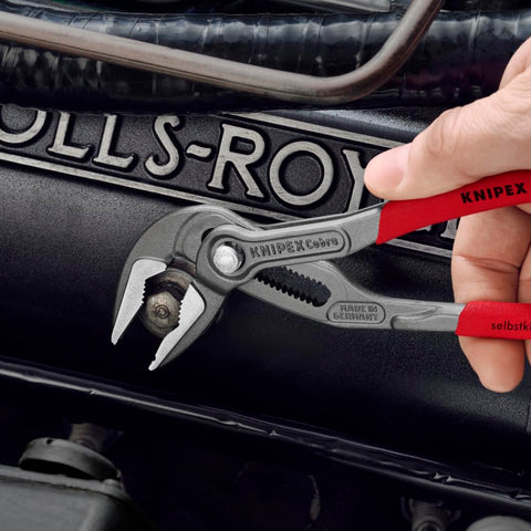KNIPEX Cobra ES self-locking grip on pipes and nuts reduces slipping.